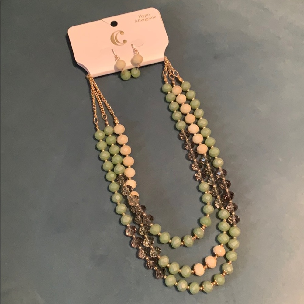 Charming Charlie 3 strand necklace and earrings